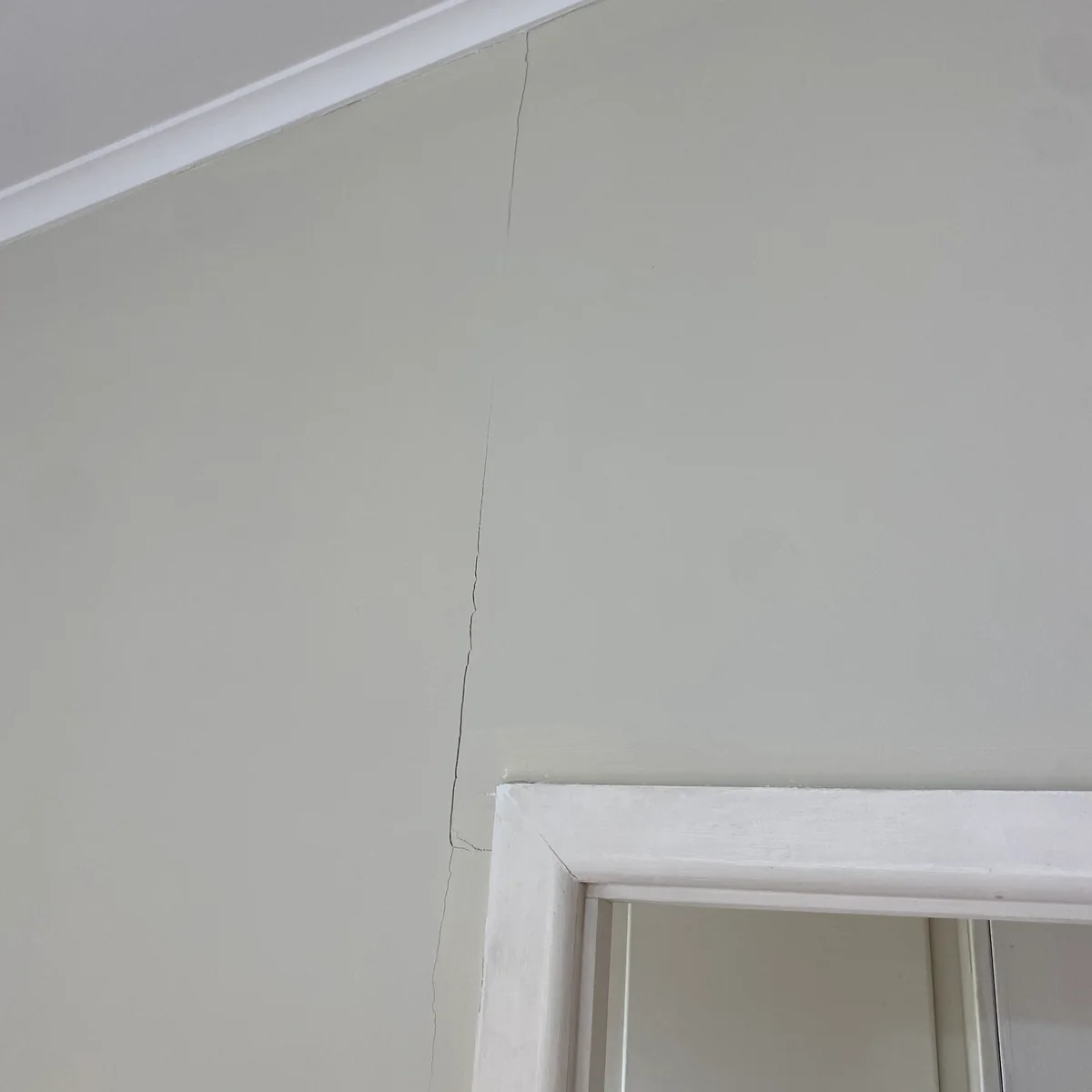 Cracking above a doorway recorded as a home-condition example